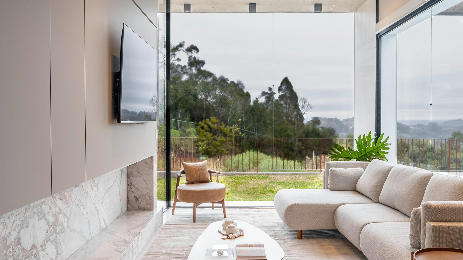 Modern media room with a discreet television and integrated sound