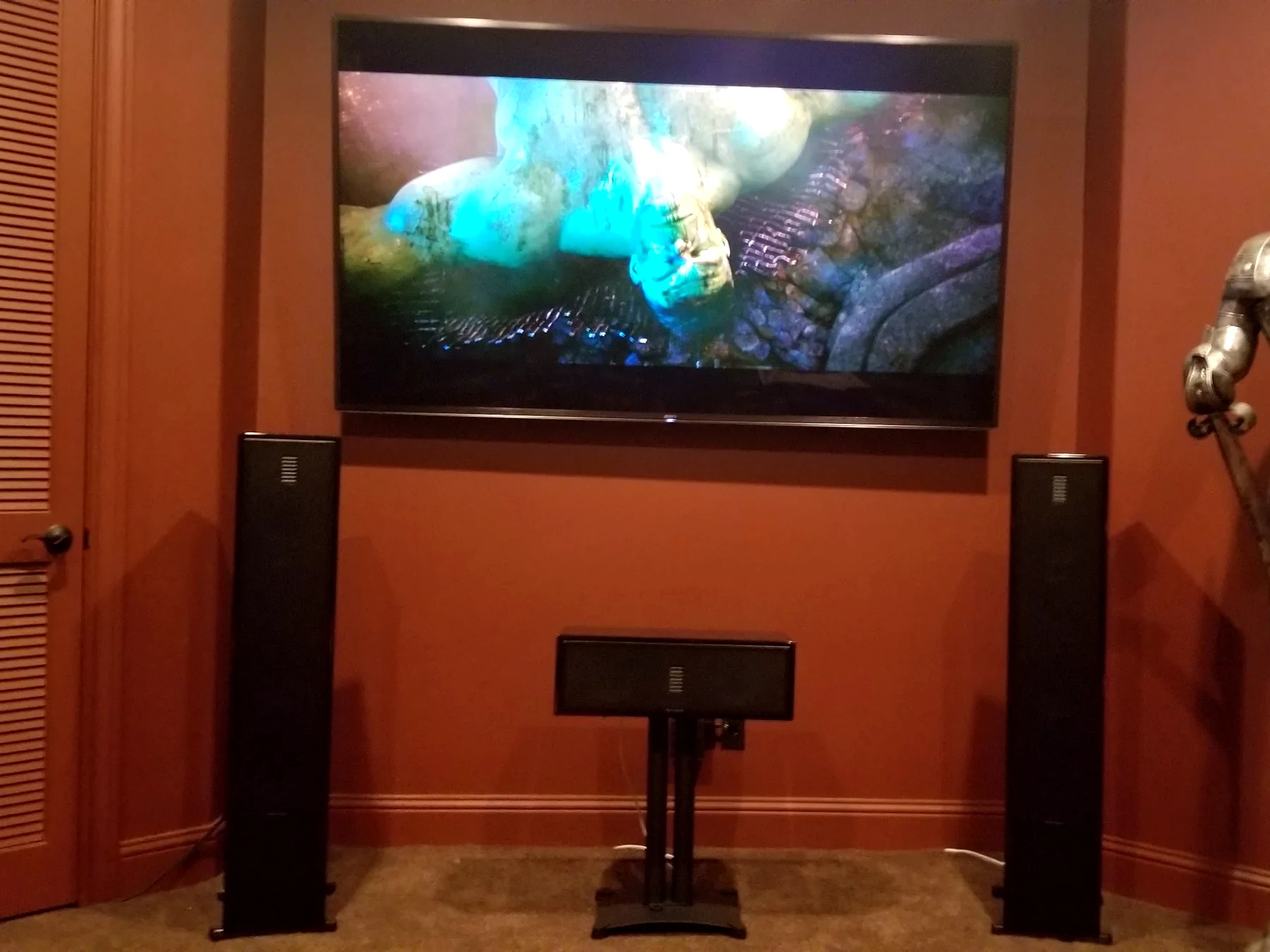 Houston media room with TV, tower speakers, center channel and subwoofer